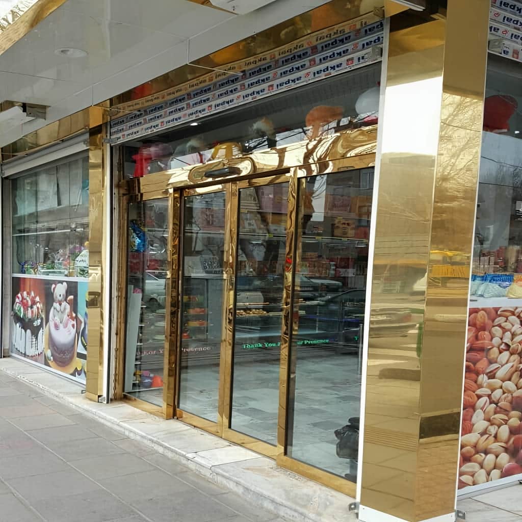 اجرای درب شیشه ای سکوریت اتوماتیک ورودی با هنگر مناسب در اصفهان