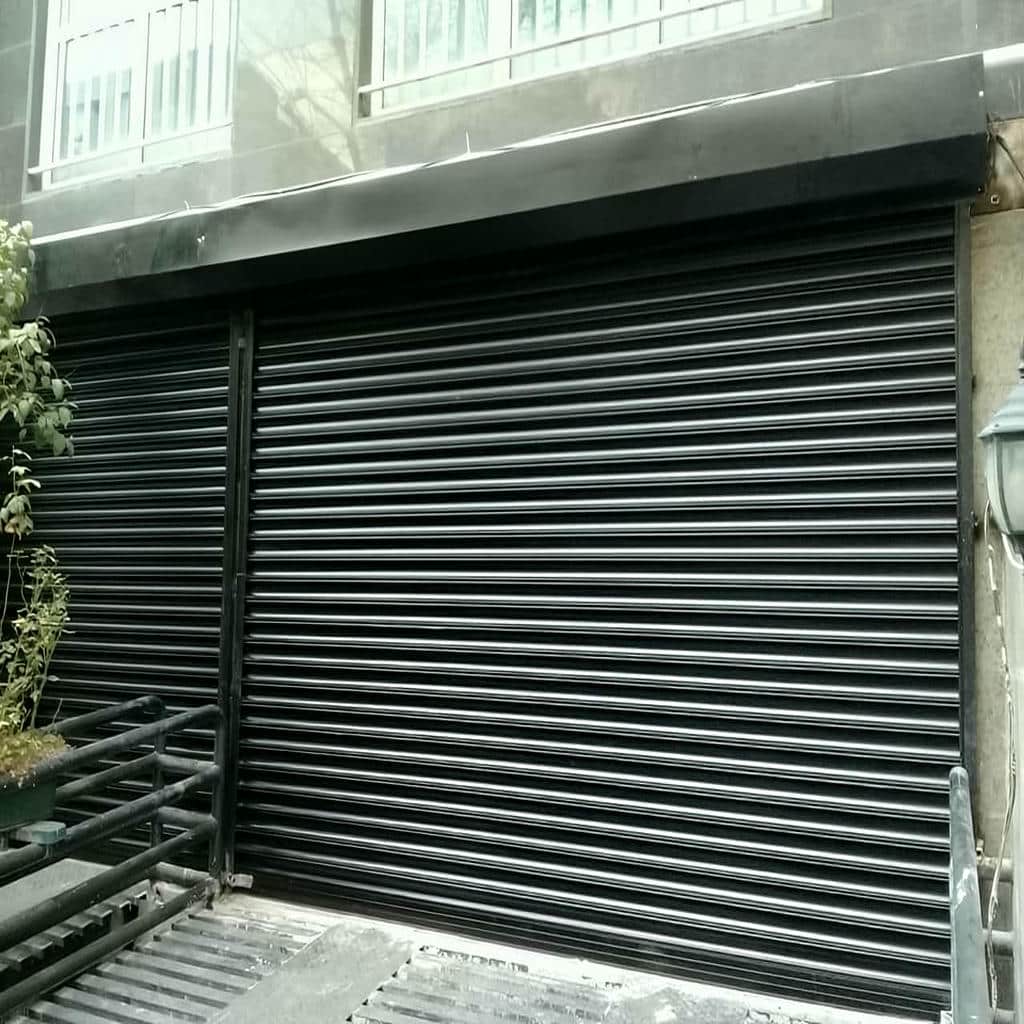 9 نمونه کرکره برقی رنگی نمای فروشگاه در اصفهان