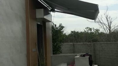 سایبان مغازه بازویی روی نمای نوساز اصفهان