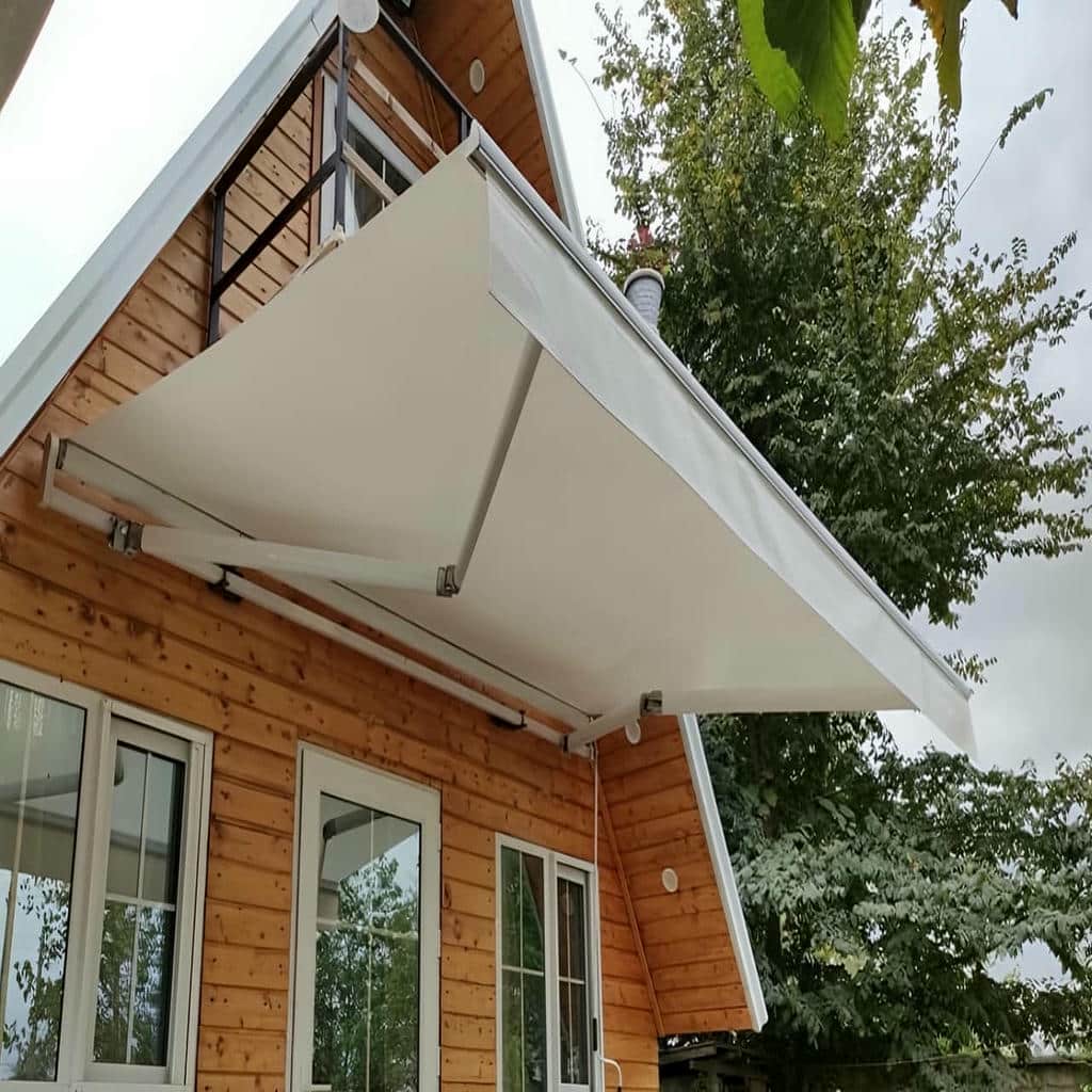 سایبان بازویی کرم برای نمای عریض ساختمان سایبان بازویی کرم برای نمای عریض ساختمان